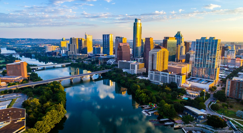 Downtown Austin skyline over Lady Bird Lake at golden hour